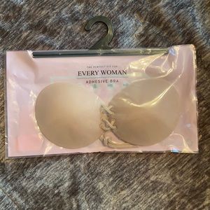 Unopened, brand new adhesive bra- nude